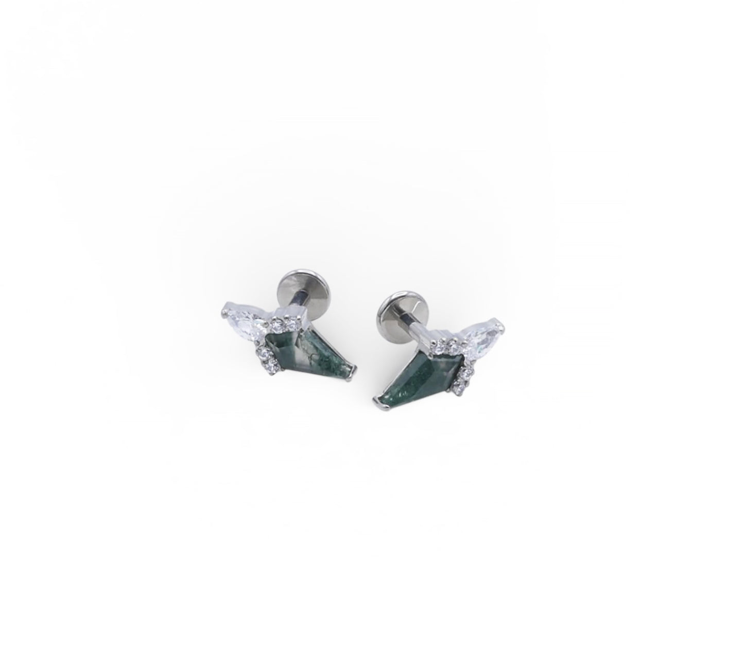 Pair of earrings with green gemstones on a white background