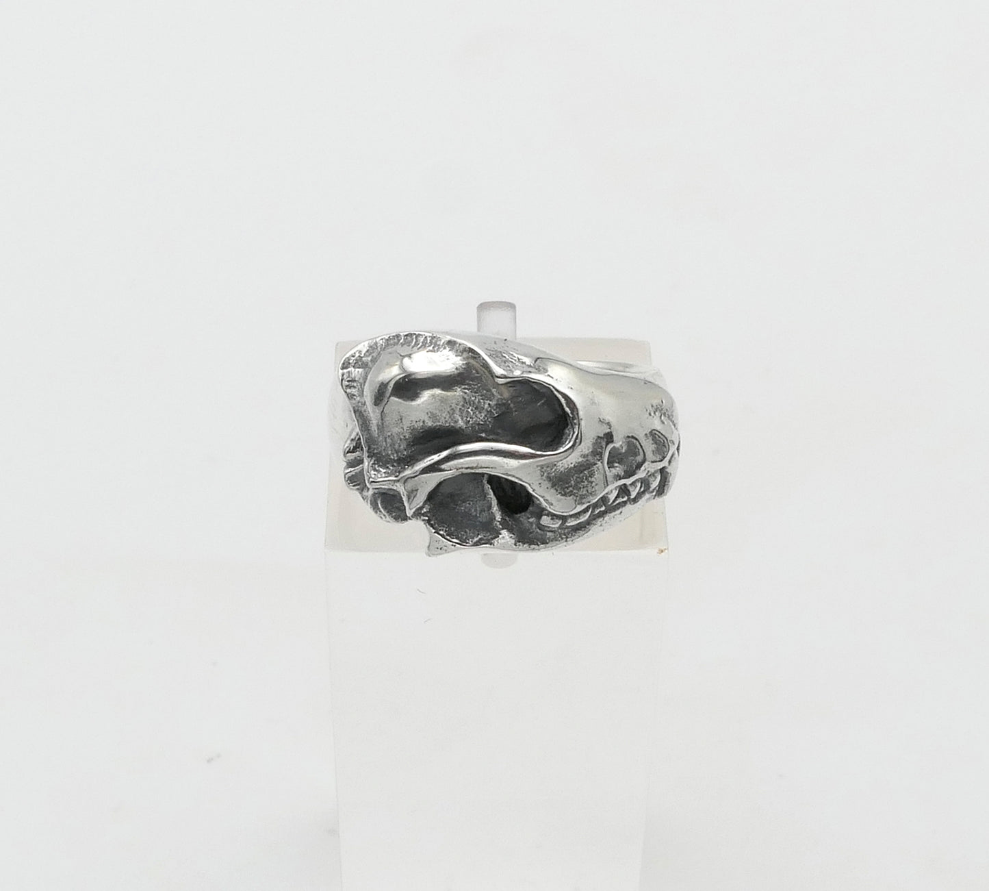 Silver fox ring with a unique design on a white background