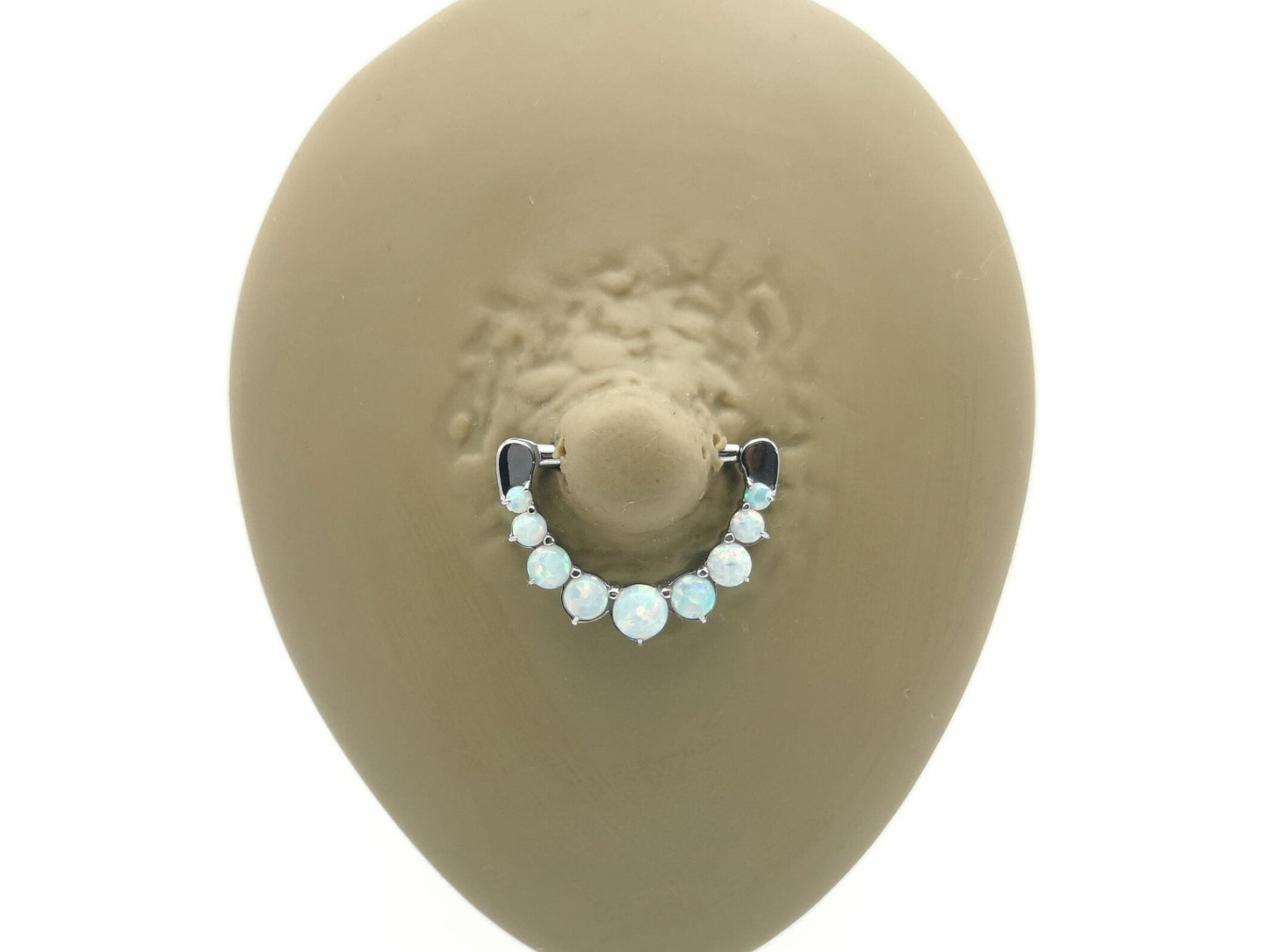 White Opal Cluster Nipple Clicker on a white background