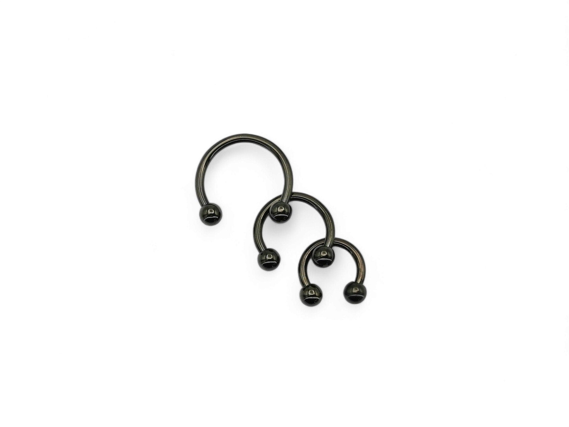 Black surgical steel horseshoe barbell, 6mm-8mm - Main Image