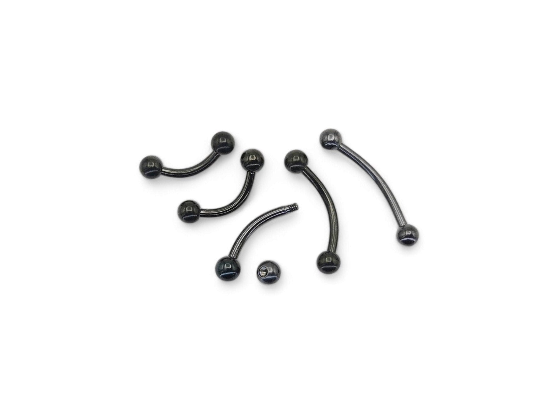 A black or gold titanium curved barbell, externally threaded for piercings, with a screw-fit ball.