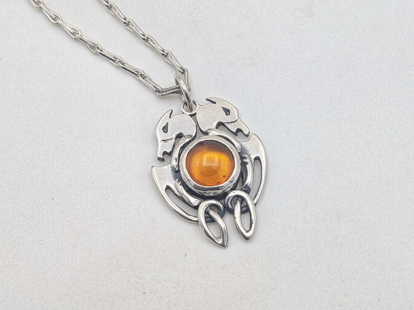 Handmade Sterling Silver Celtic Dog Pendant with Amber – Crafted in Our Workshop