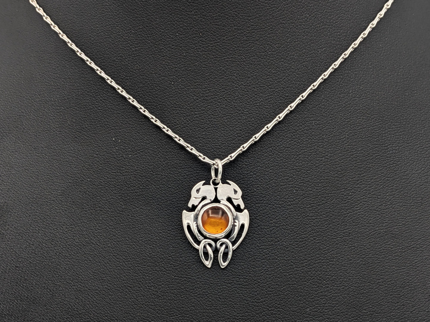Handmade Sterling Silver Celtic Dog Pendant with Amber – Crafted in Our Workshop