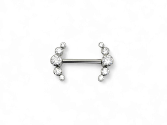 A titanium barbell piercing with a jewelled crescent design featuring five brilliant cut crystal gemstones.