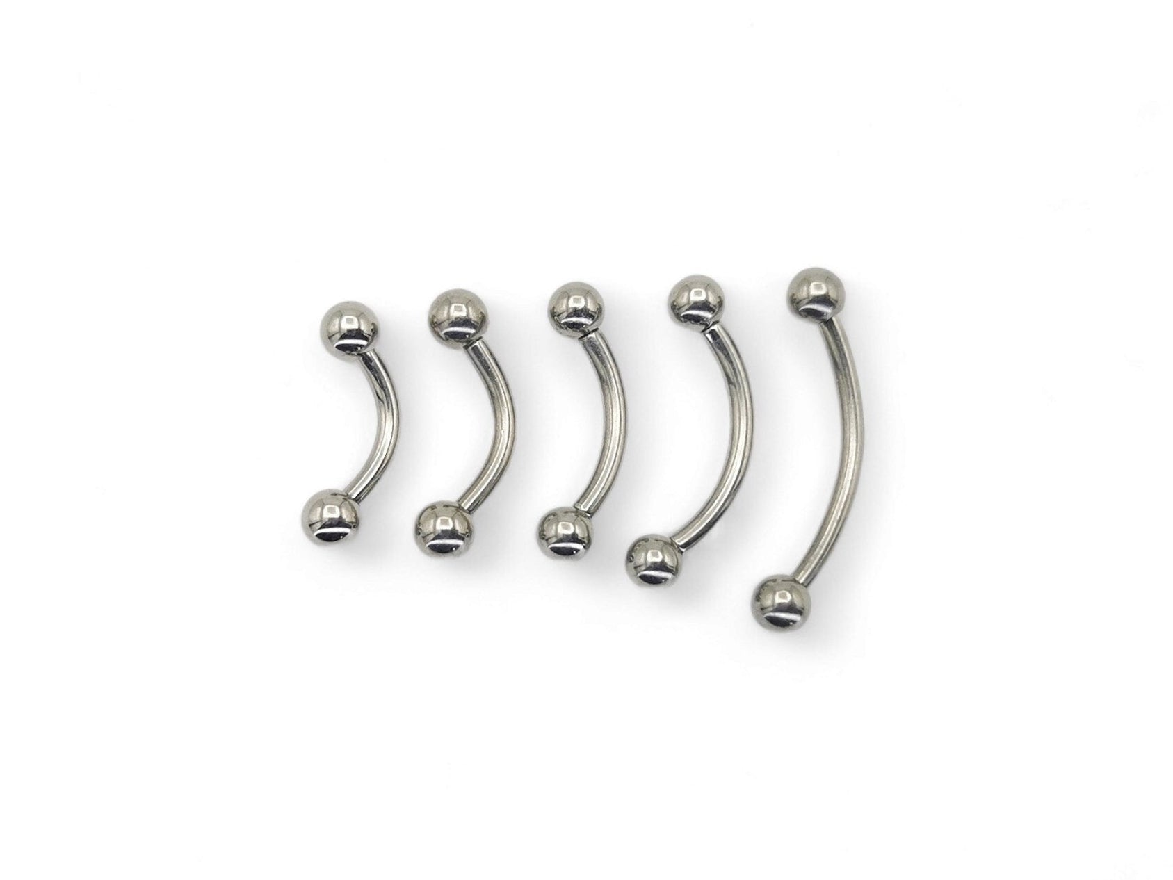 A collection of titanium curved barbells with screw fit balls, varying in length, on a white background.
