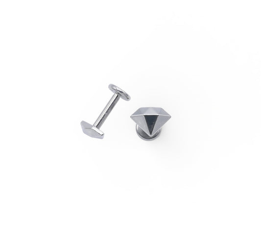 Silver stud earrings on a white background