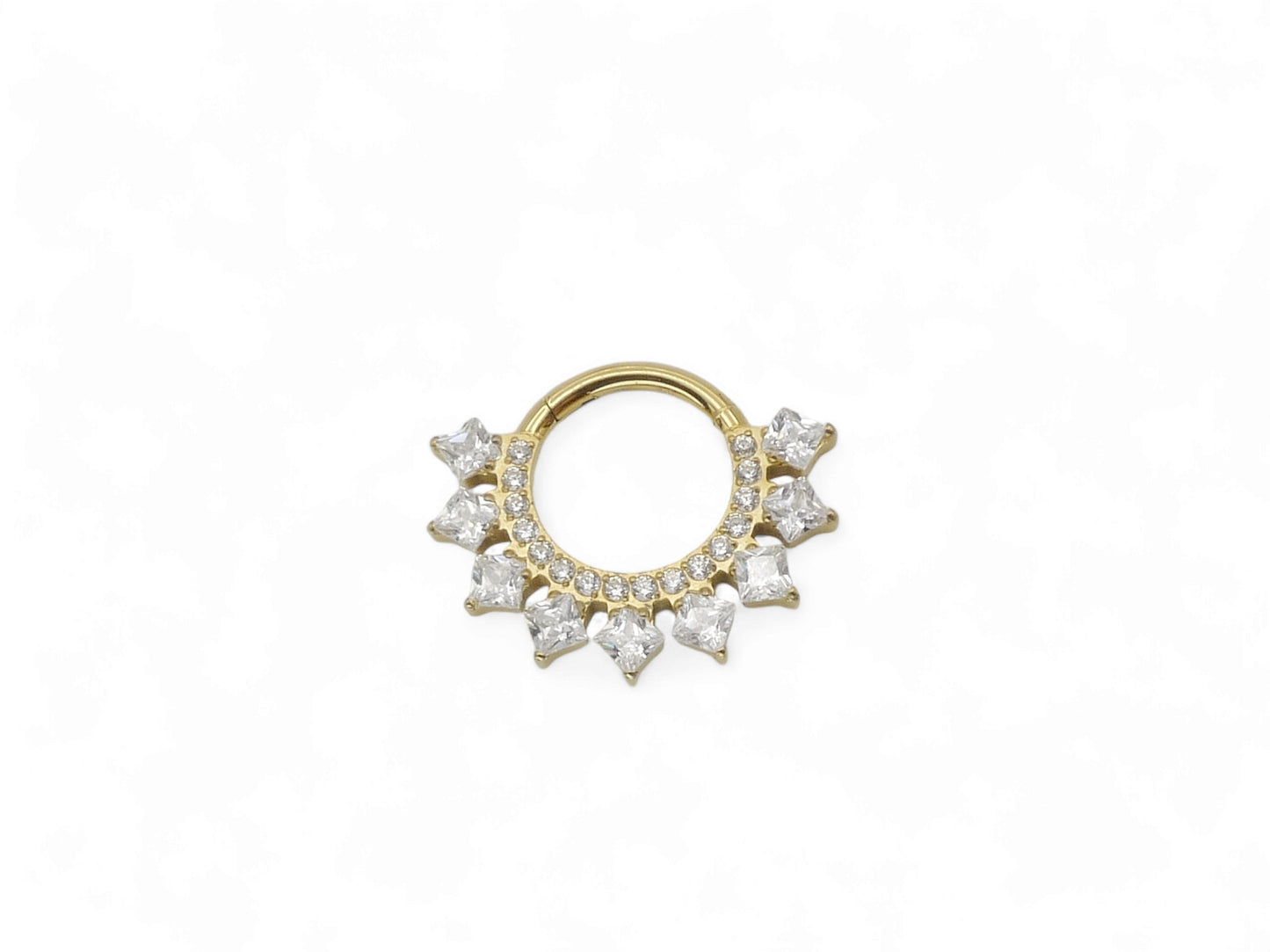 A gold titanium hinged clicker ring with a cluster of square-cut clear gems around the central ring for septum or daith piercings.