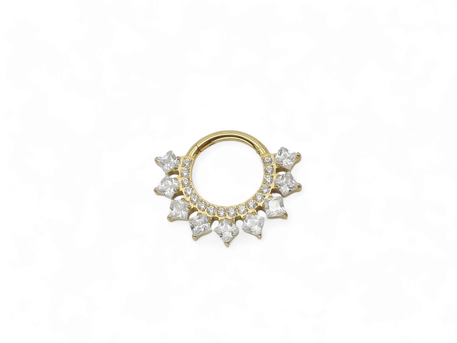 A gold titanium hinged clicker ring with a cluster of square-cut clear gems around the central ring for septum or daith piercings.