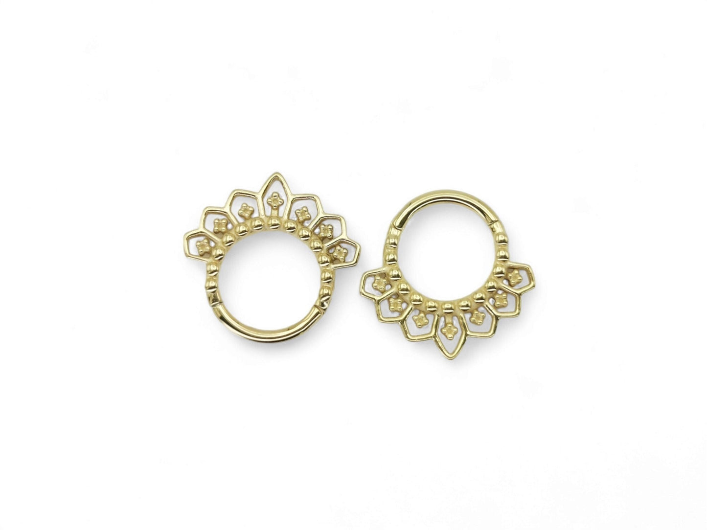 Two gold PVD surgical steel mandala clicker rings with an 8mm internal diameter, designed for 1.2mm/16g septum piercings, featuring intricate filigree patterns.