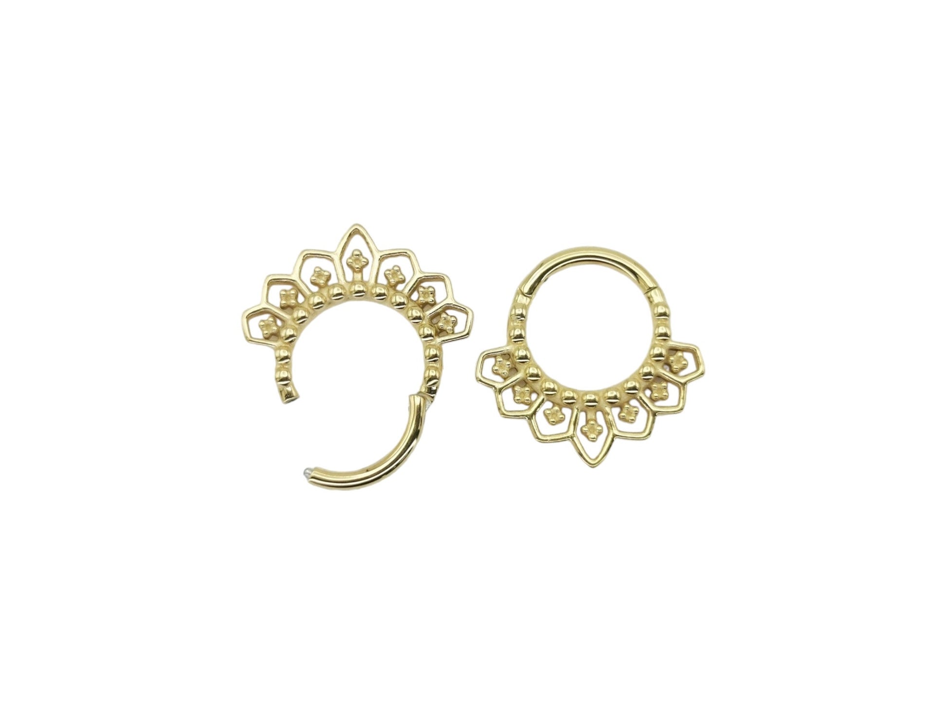 Two gold PVD surgical steel mandala clicker rings with an 8mm internal diameter, designed for 1.2mm/16g septum piercings, featuring intricate filigree patterns.