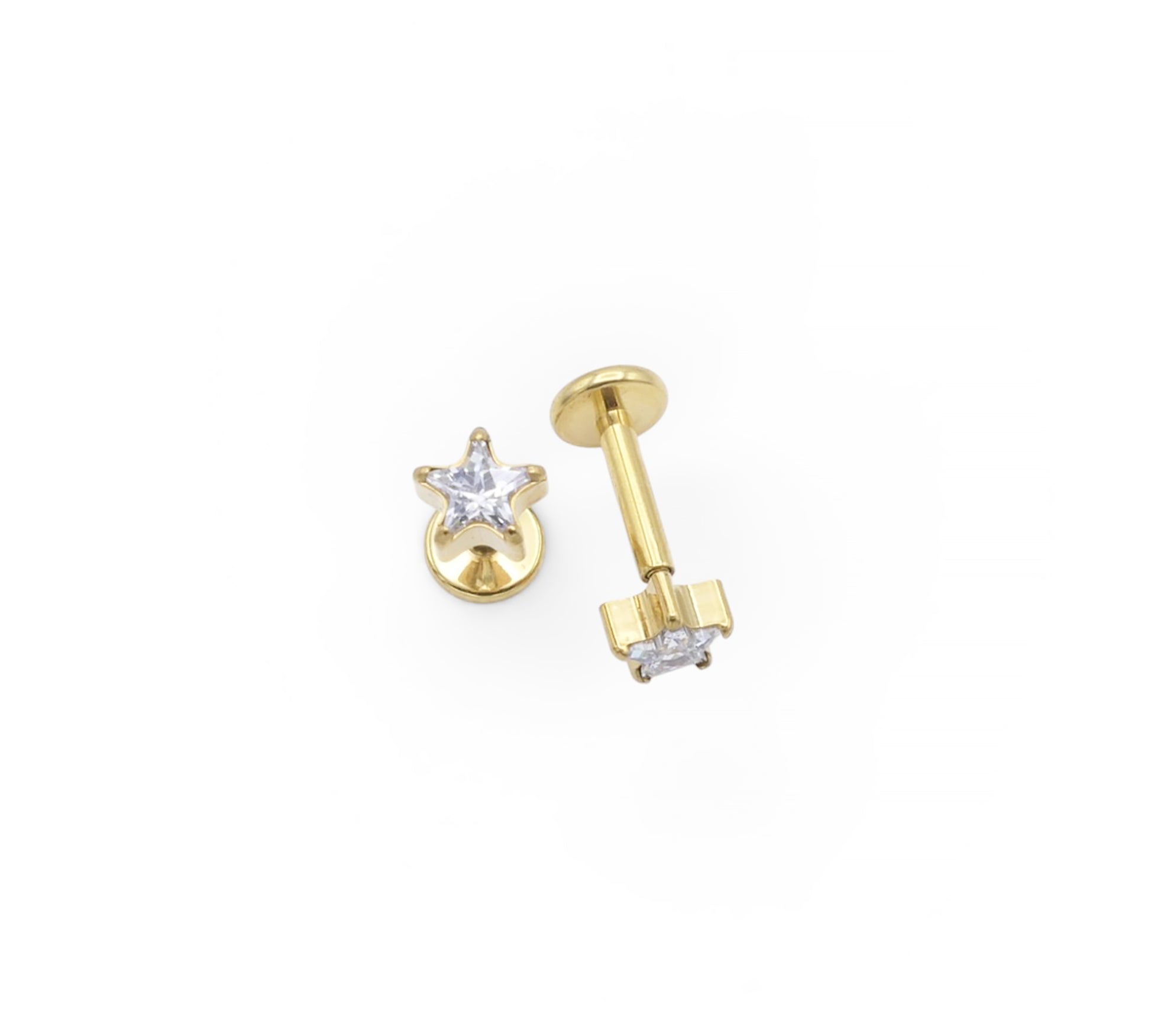 Gold stud earrings with clear gemstones on a white background