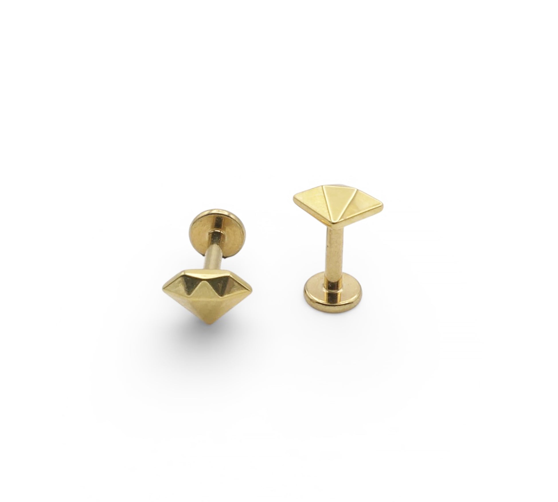 Pair of gold geometric earrings on a white background