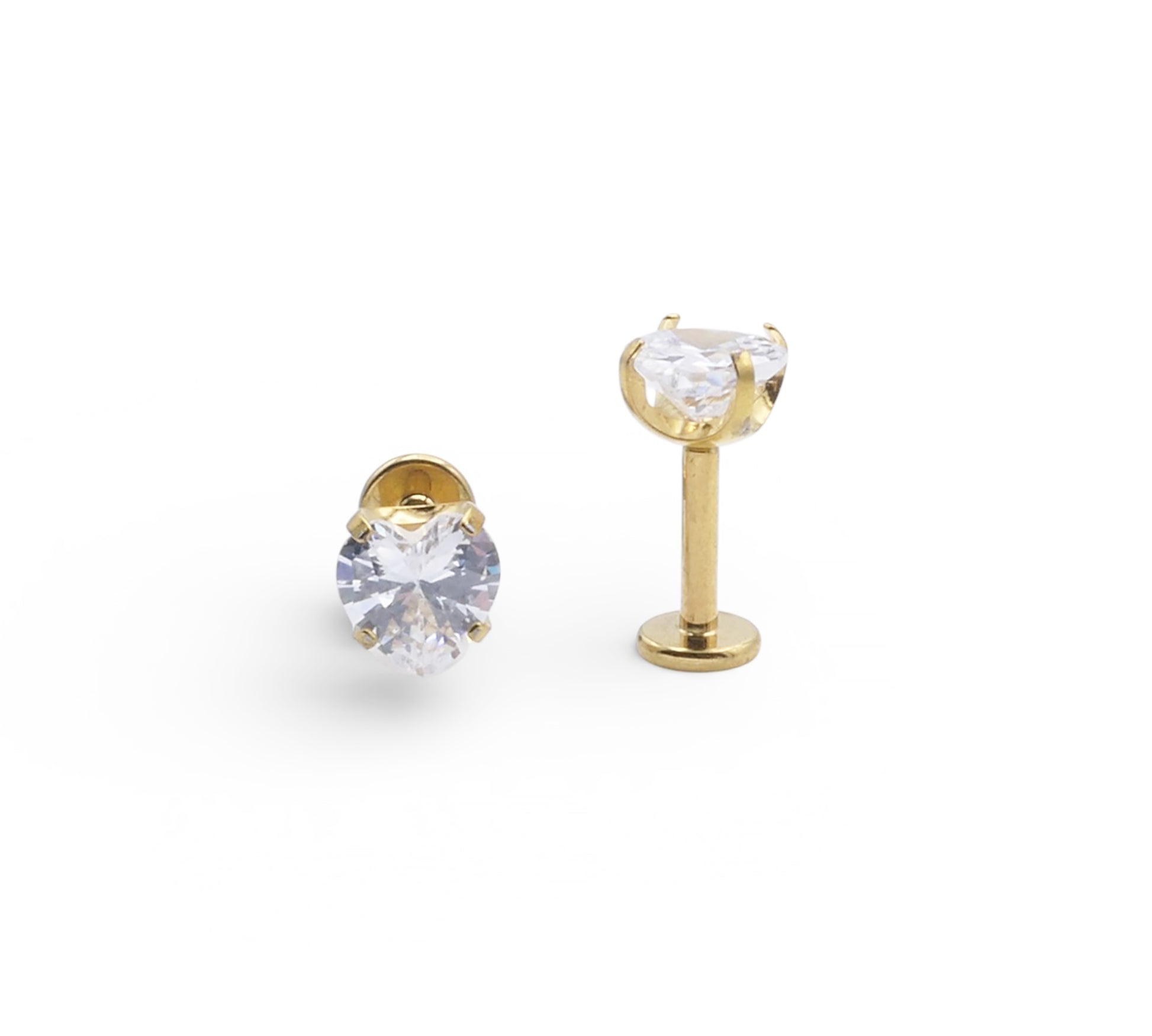Gold stud earrings with clear gemstones on a white background