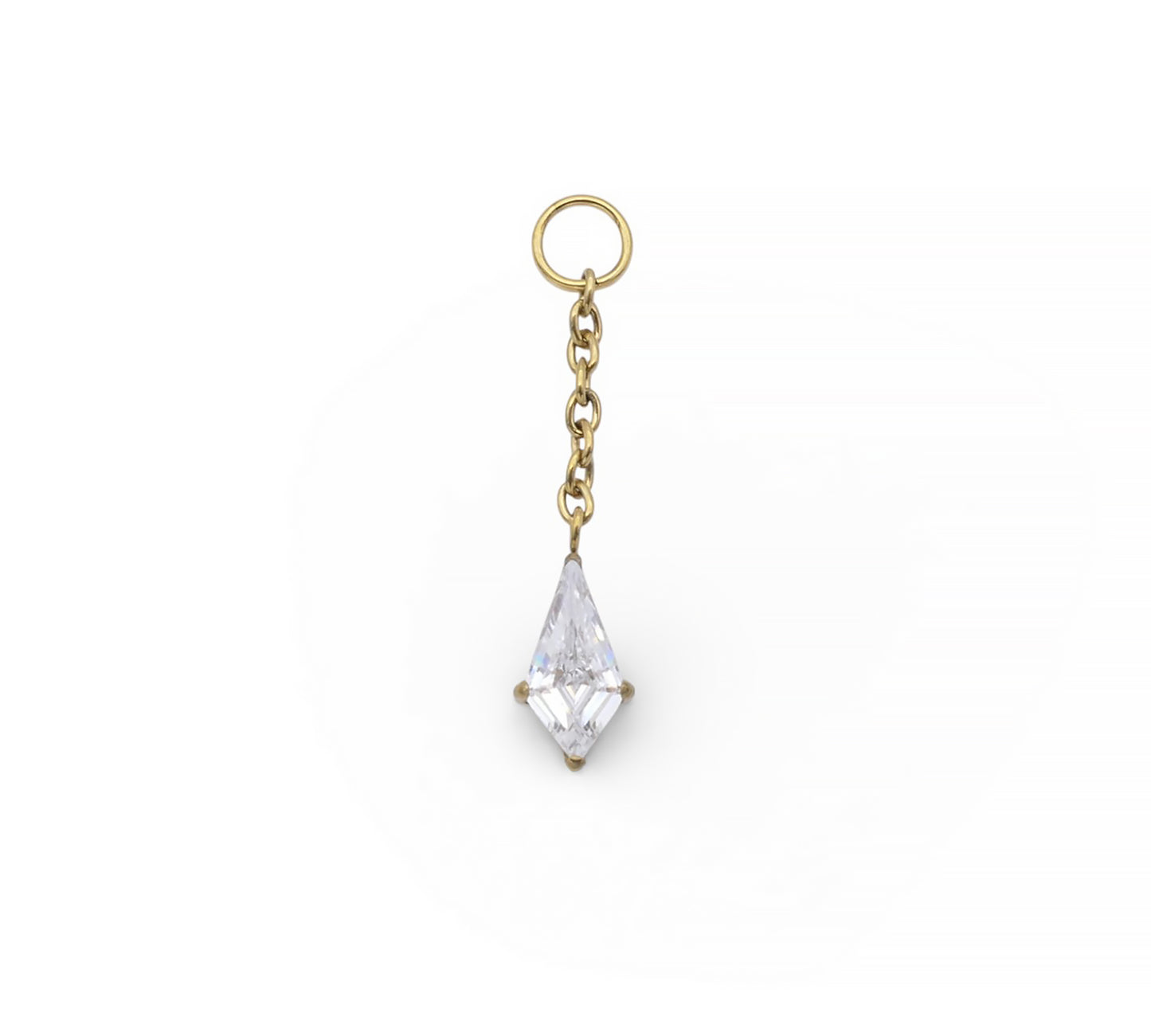 Gold earring with a clear teardrop-shaped gemstone on a white background