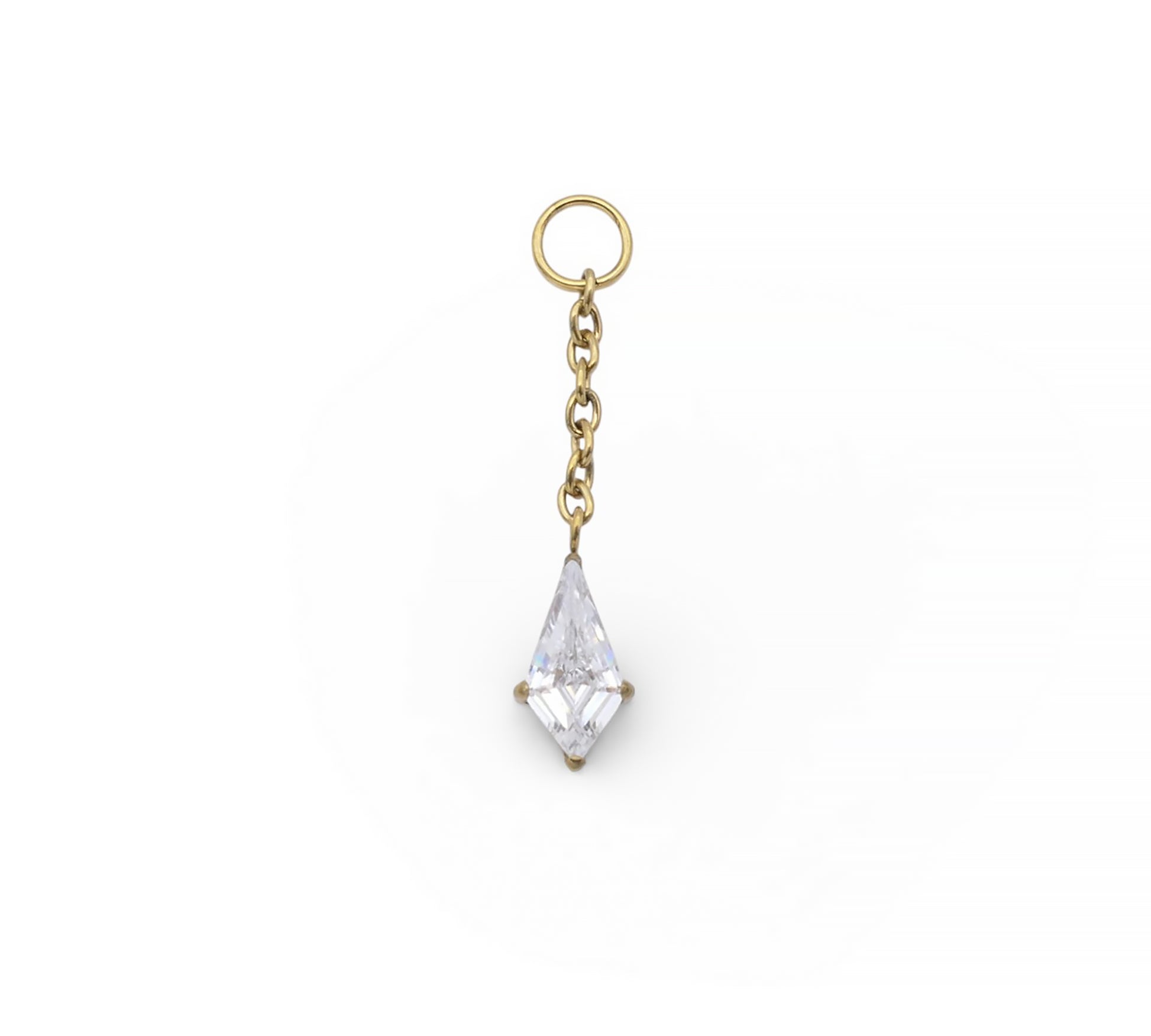 Gold earring with a clear teardrop-shaped gemstone on a white background