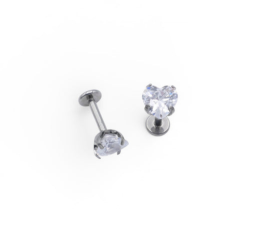 Two silver stud earrings with clear gemstones on a white background