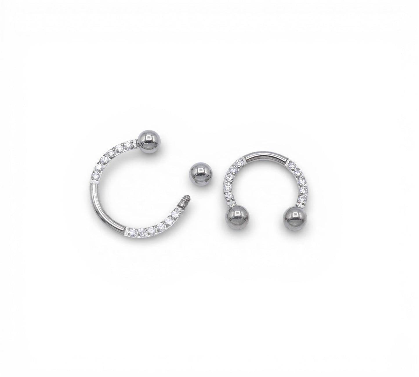 Jewelled circular barbells on a white background