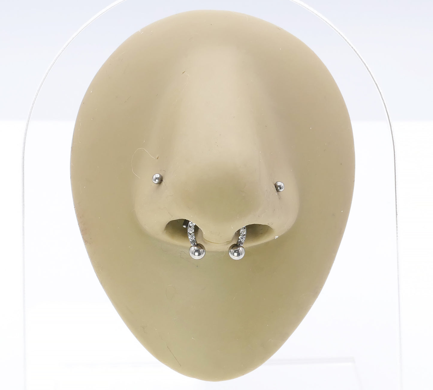 Jewelled circular barbell on a nose model