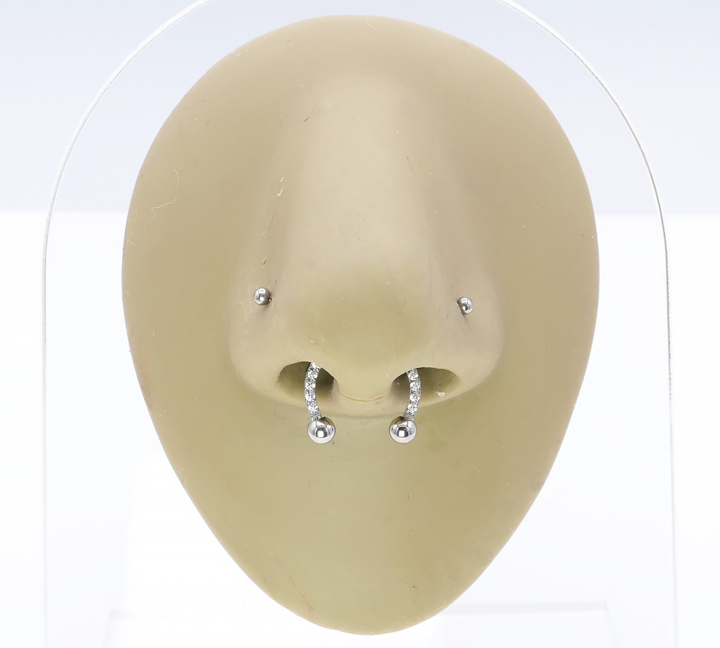 Jewelled circular barbell on a nose model