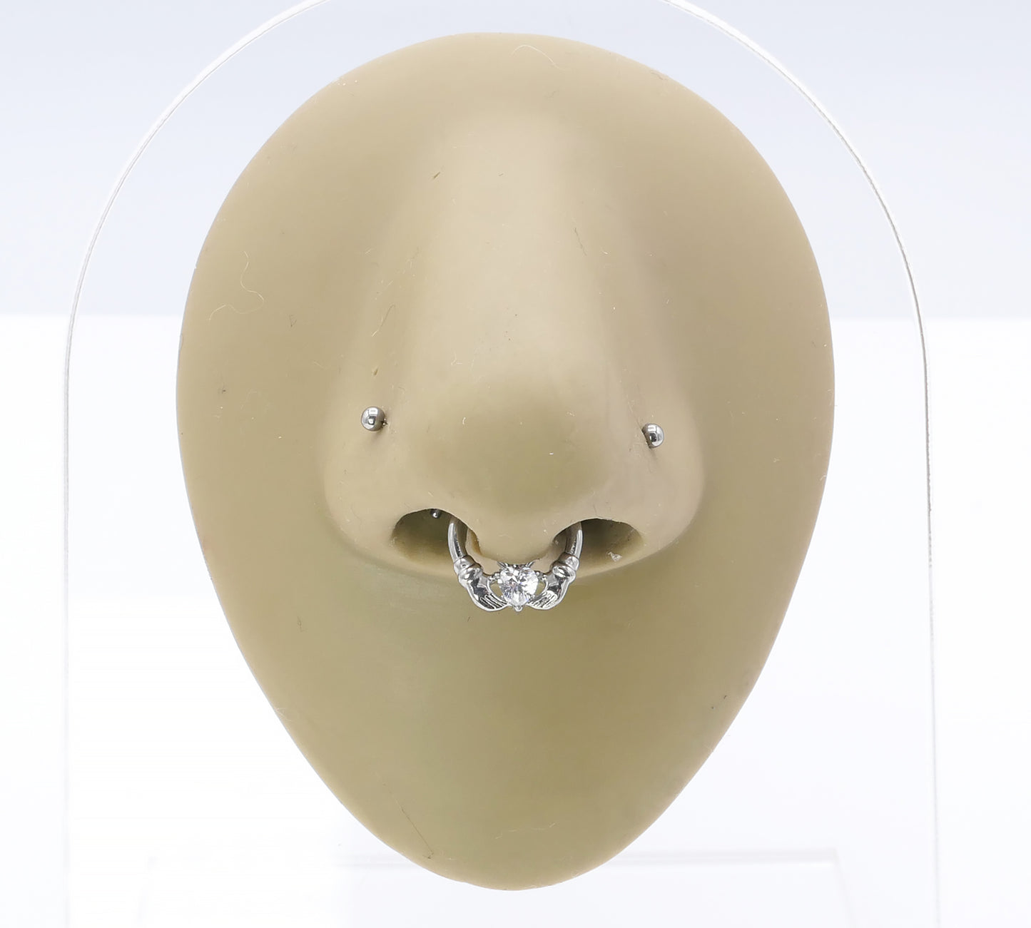 Jewelled Titanium Claddagh Clicker on a nose model