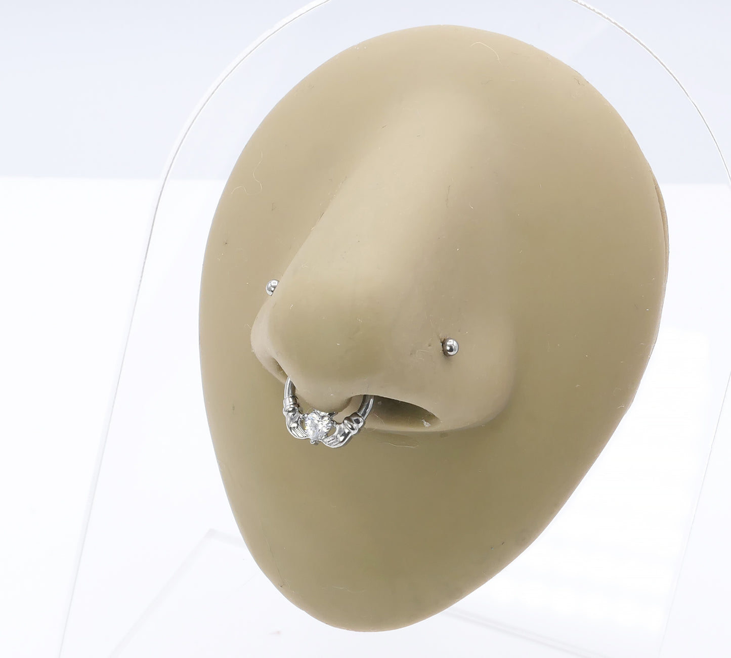 Jewelled Titanium Claddagh Clicker on a nose model