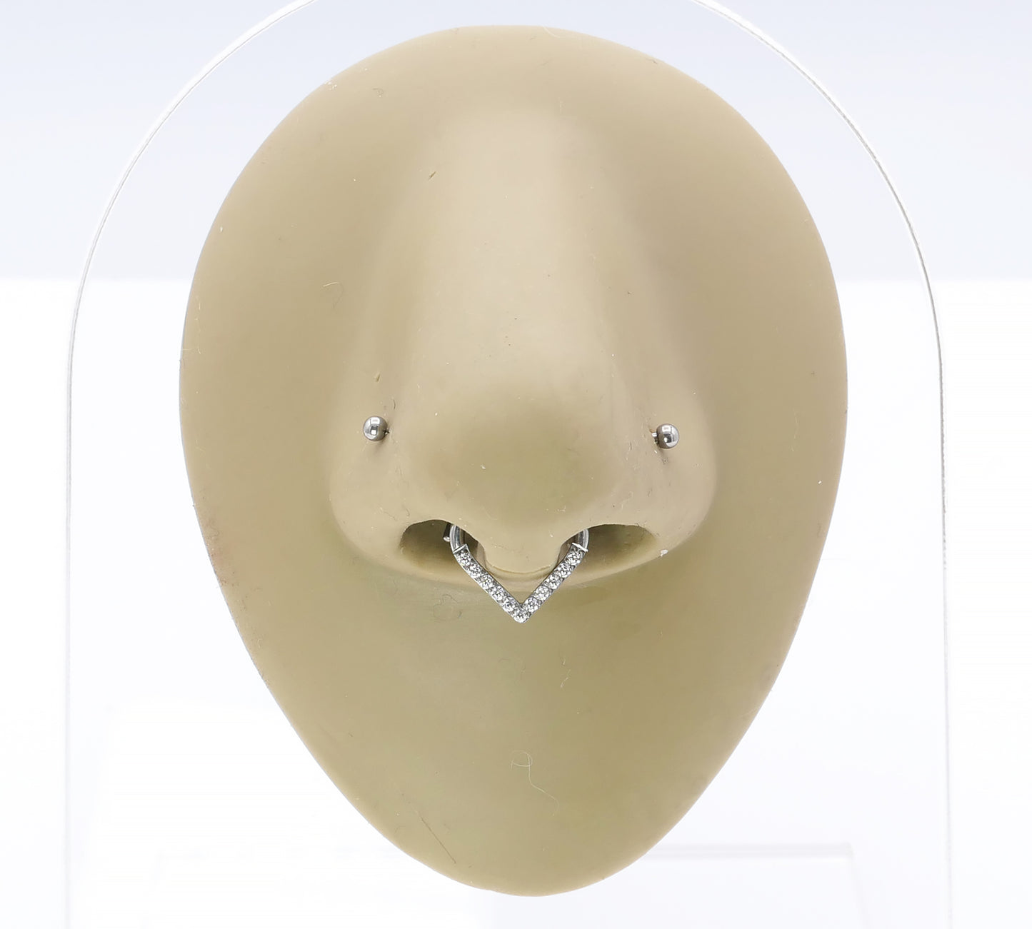 Jewelled Titanium Wishbone Clicker on a nose model