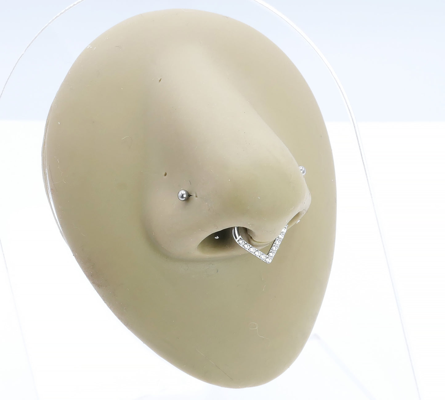 Jewelled Titanium Wishbone Clicker on a nose model