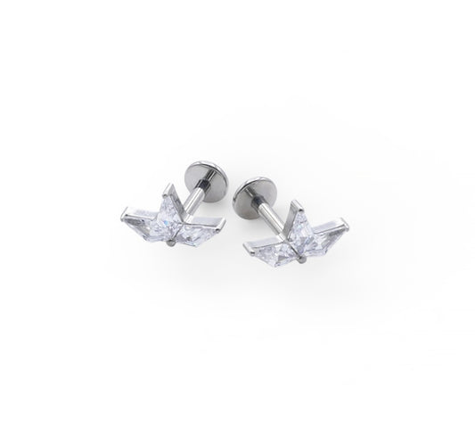 Kite shape gemset earrings on a white background
