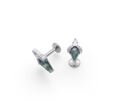 Pair of earrings with green gemstones on a white background