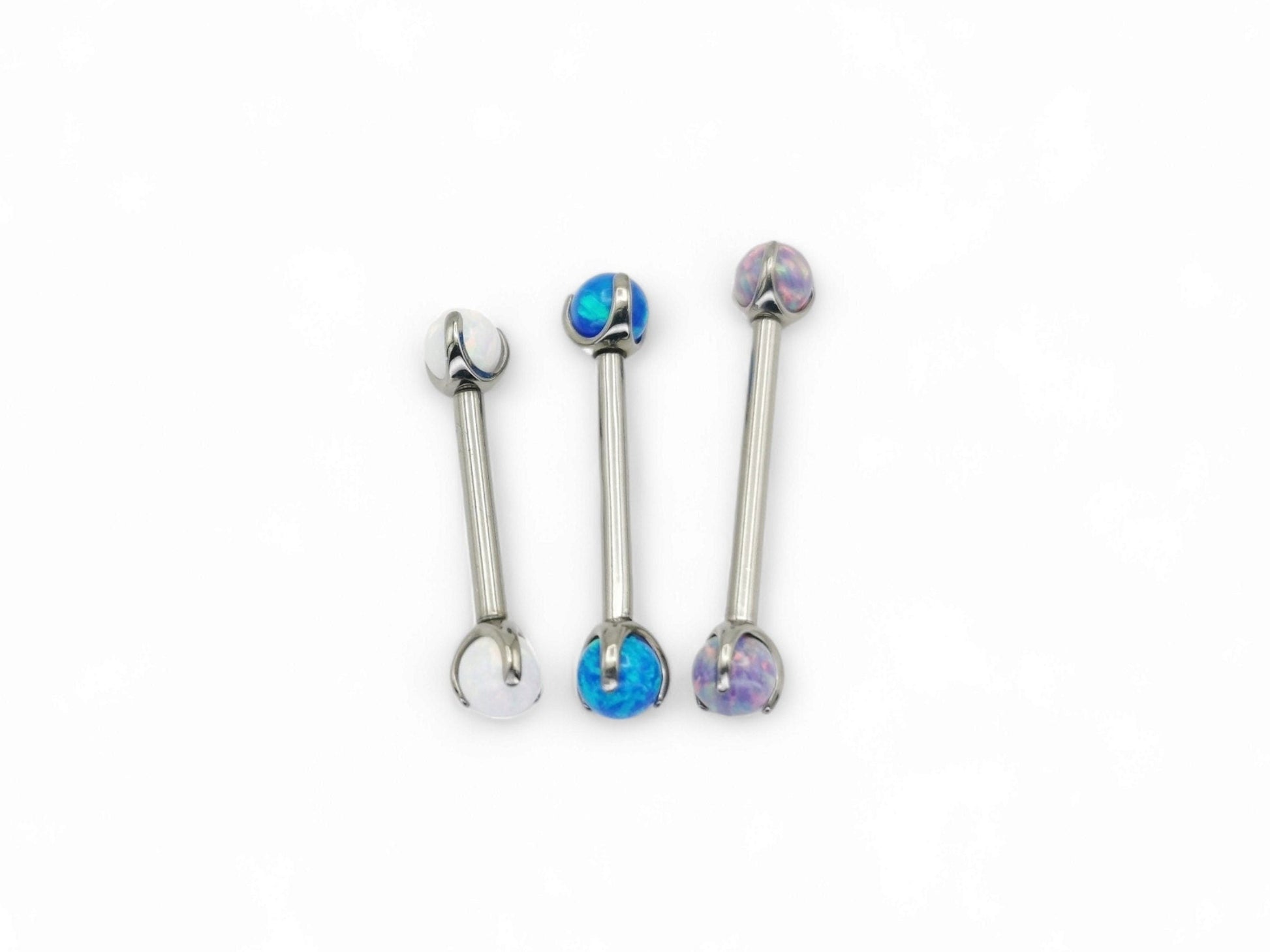 A set of three titanium barbells with synthetic opal beads in white, blue, and pink colors, arranged in increasing length from 12mm to 16mm.