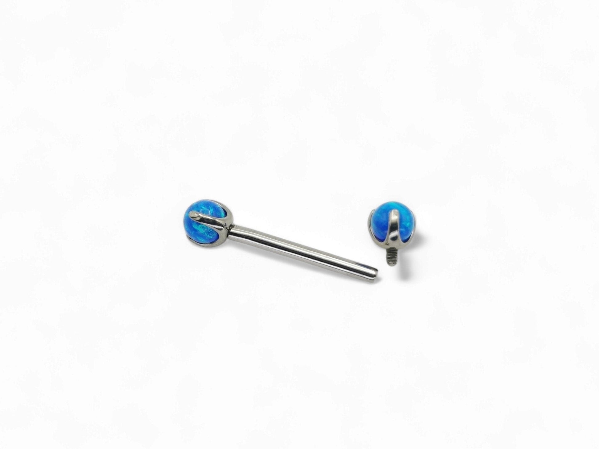 A set of three titanium barbells with synthetic opal beads in white, blue, and pink colors, arranged in increasing length from 12mm to 16mm.
