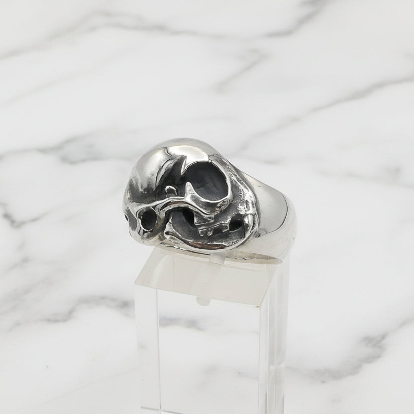 Silver cat skull ring with on a white background