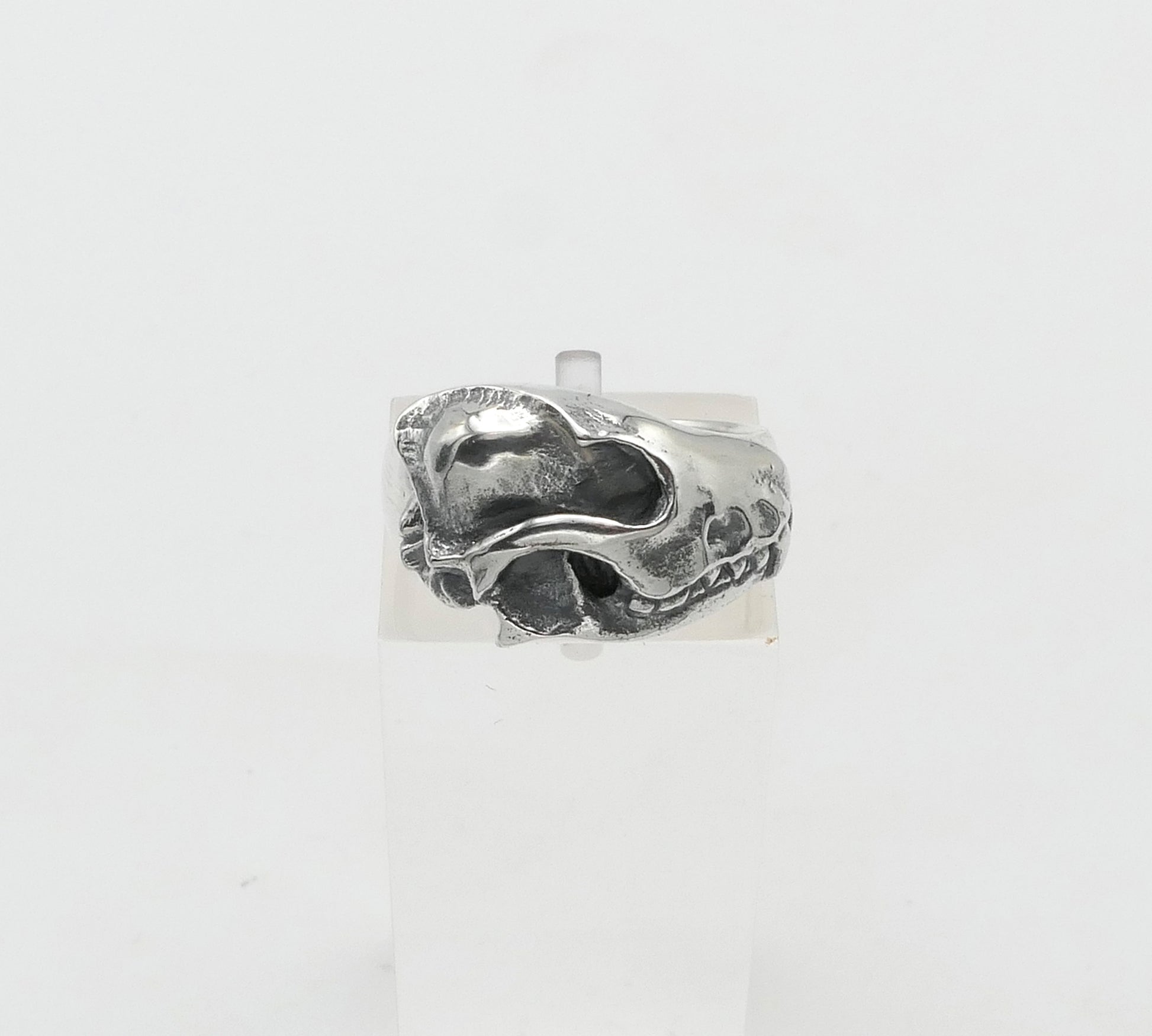 Silver fox ring with a unique design on a white background