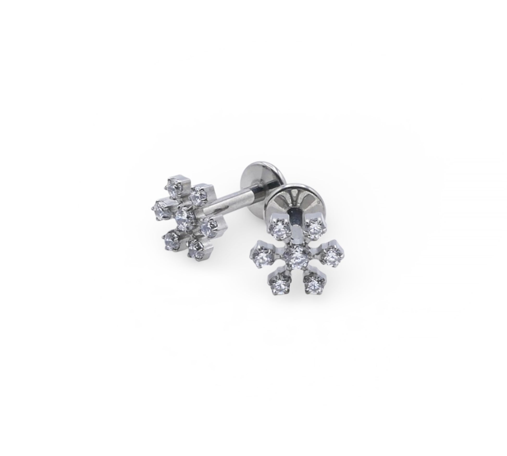 Pair of silver snowflake-shaped earrings on a white background