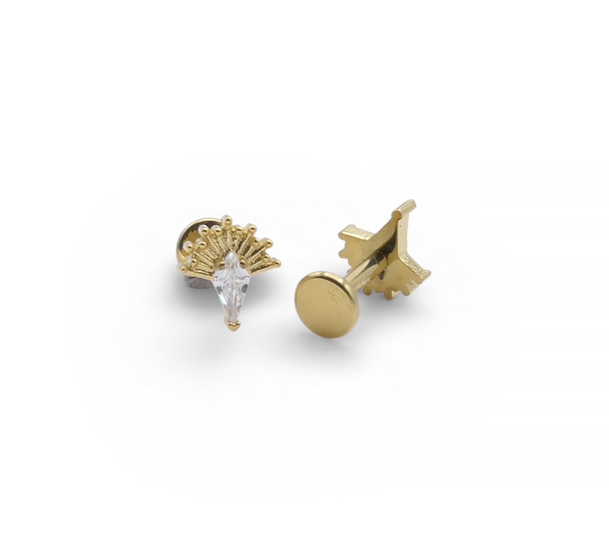 Gold earrings with a clear gemstone on a white background