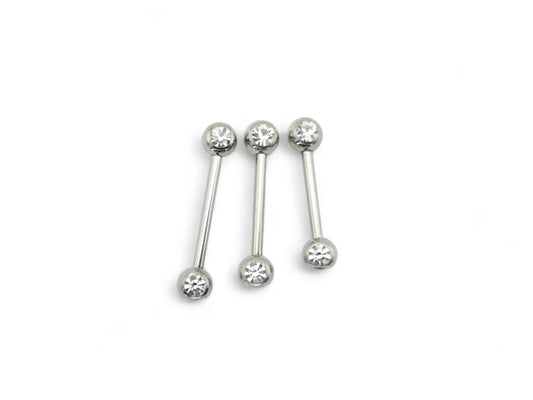 A set of three surgical steel barbells with jewelled ends, varying in length, on a white background.