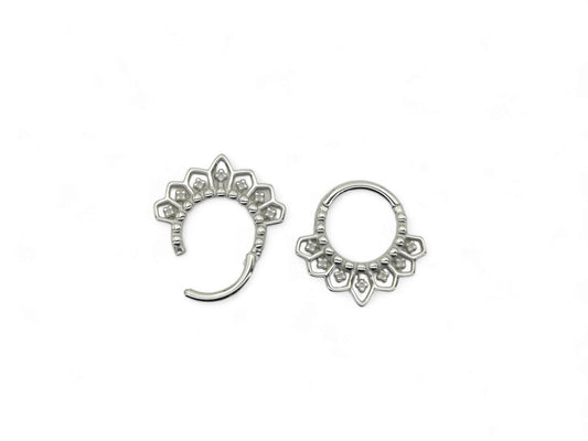 Surgical steel mandala clicker rings, for septum or a daith piercing, with intricate filigree patterns on a white background