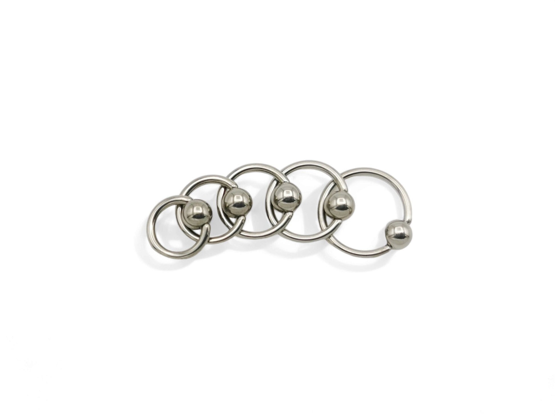 A polished titanium BCR with a high polished finish, designed for 1.2mm/16g piercings, featuring a ball closure mechanism.