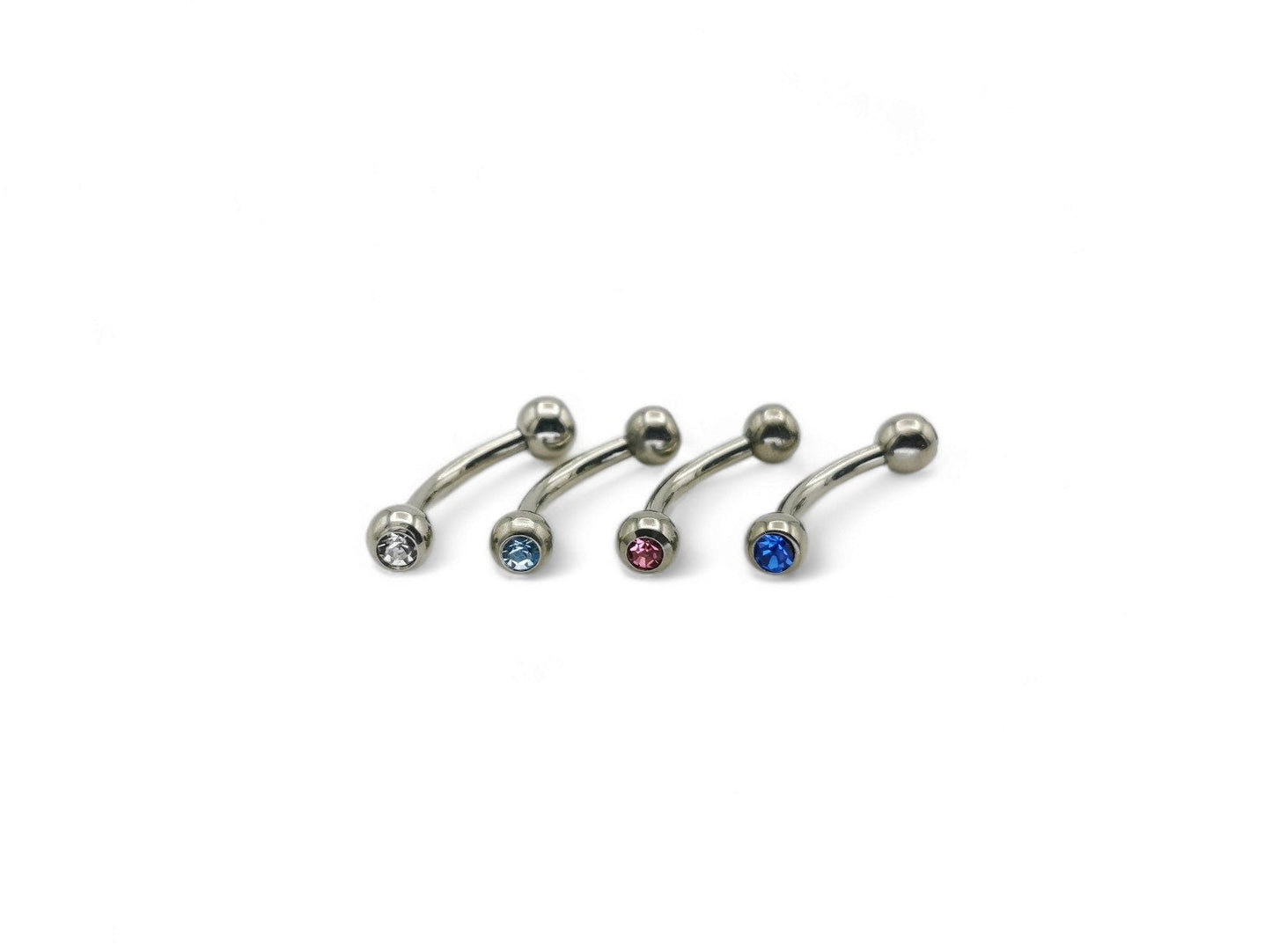Titanium barbells with gemset crystals on both ends, available in multiple colors.