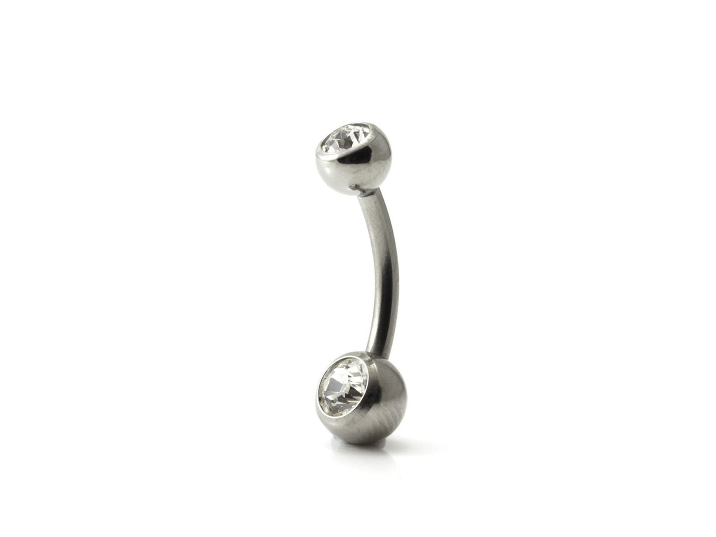 A single titanium double jewelled navel bar with clear crystal embellishments.