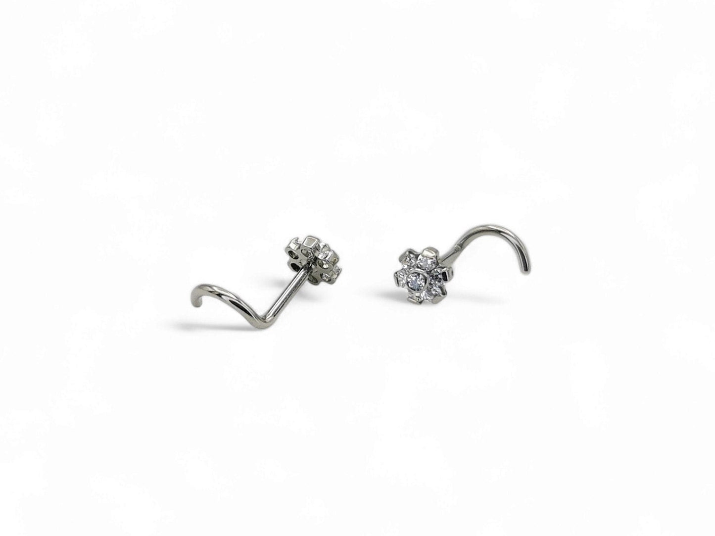 Titanium Jewelled Flower Nose Studs on a white background