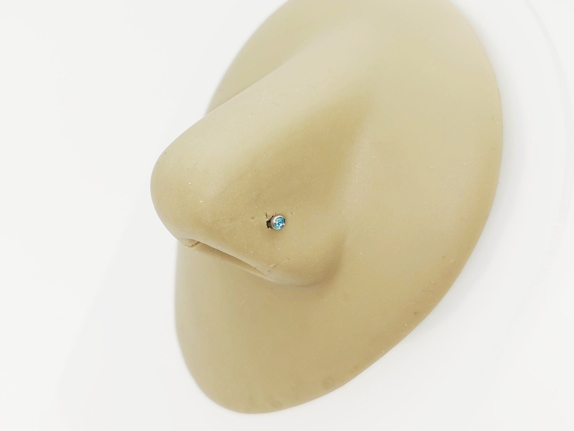 Titanium Jewelled Nose Stud on a nose