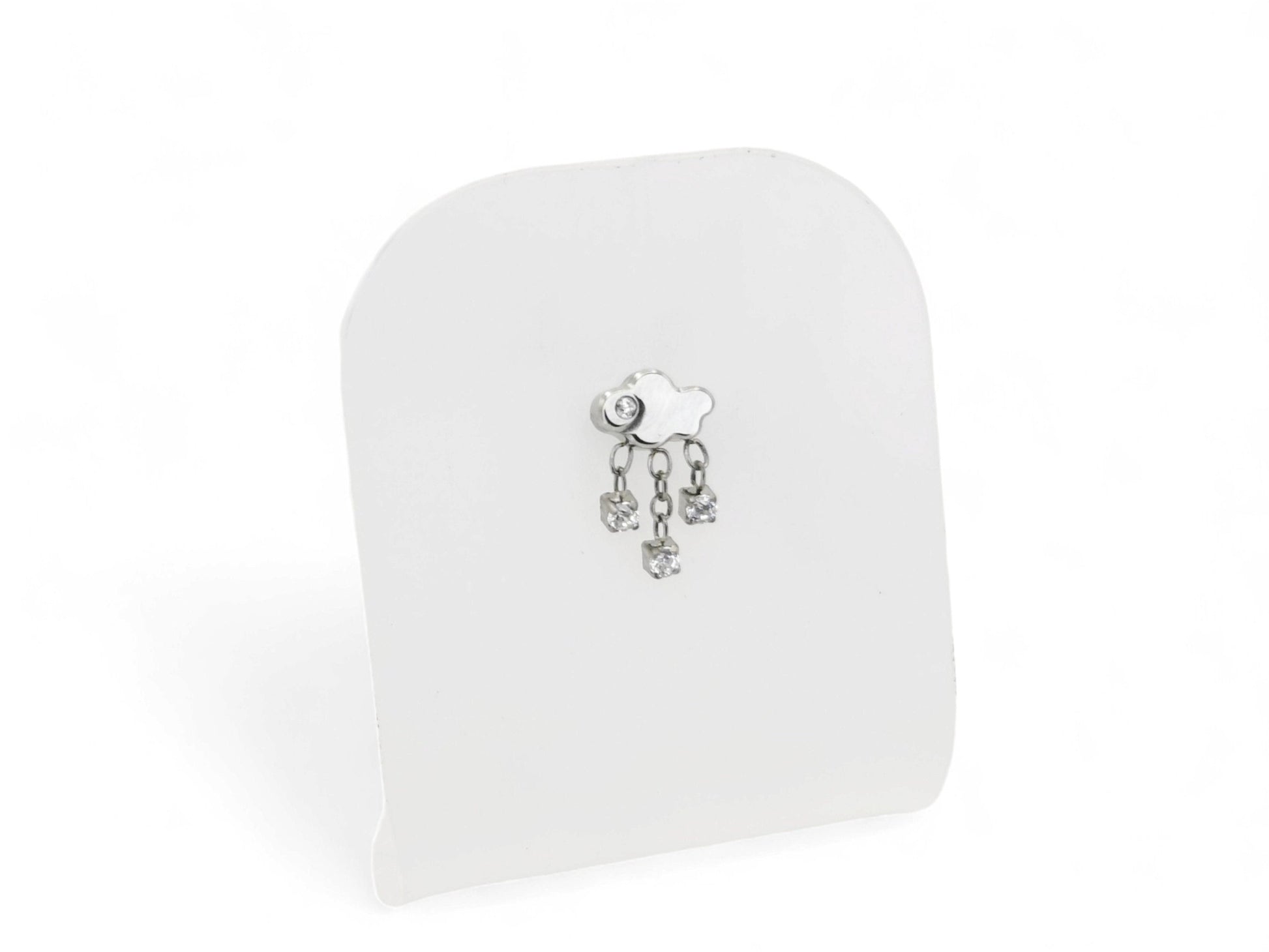 A silver-colored titanium threadless stud with a rain cloud shape and three jewelled rain drops, placed on a white background.