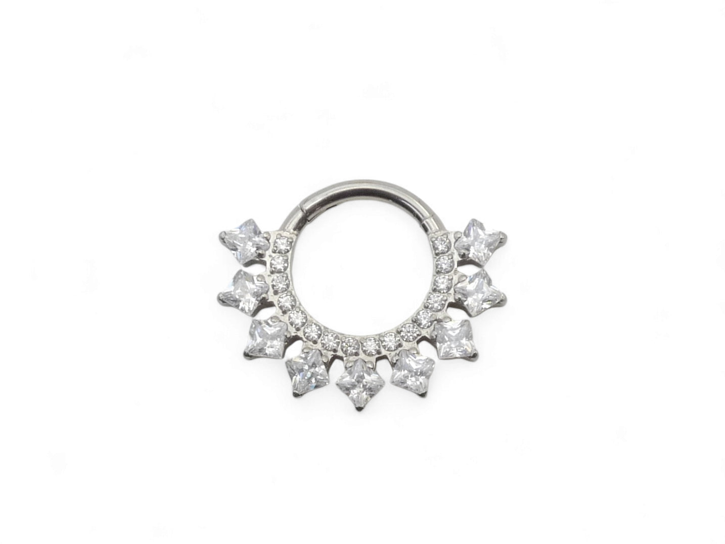 A titanium jewelled hinged clicker ring with a cluster of square-cut gems around the main ring.