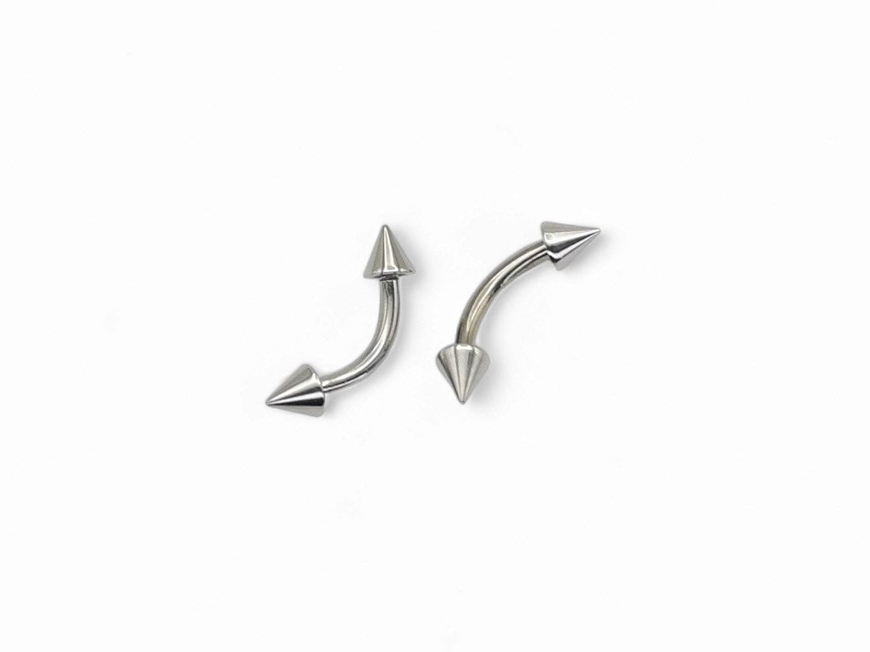 Surgical steel curved barbell with spikes, intended for eyebrow, rook, and anti tragus piercings.