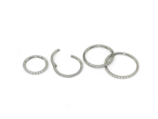 Titanium jewelled clicker ring with clear crystal pave set, intended for use with 1.2mm/16g piercings.