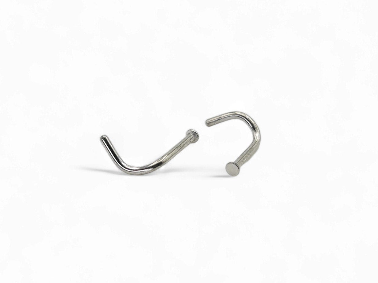 Titanium micro disc nose stud on a white background