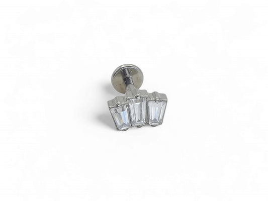 A single titanium push fit baguette cluster stud with multiple clear gemstones, against a white background.