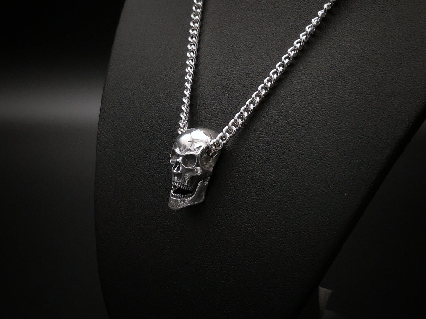 Large silver skull pendant necklace with silver curb chain