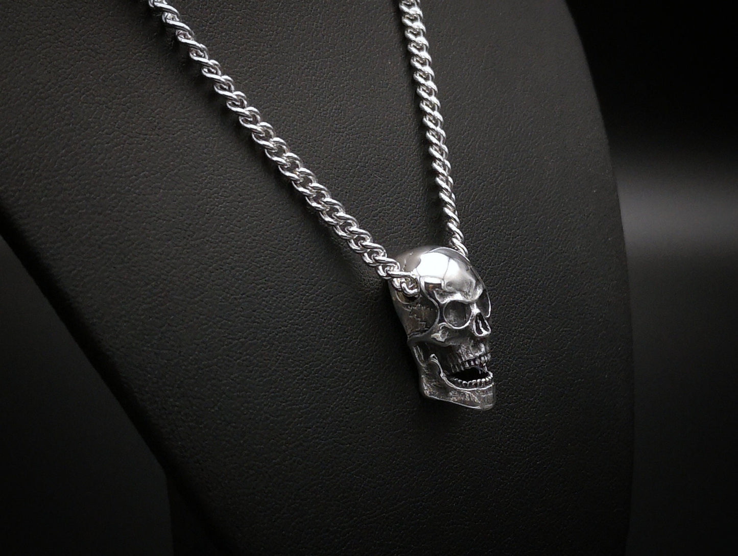 Large silver skull pendant necklace with silver curb chain